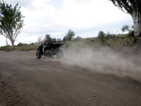 A serviceman of the Motorised Rifle Battalion of the 93rd Kholodnyi Yar Separate Mechanized Brigade of the Ukrainian Armed Forces is riding...