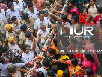 Police are clashing with the Women's Cell of the Bharatiya Janata Party (BJP) during a protest demonstration in Kolkata, India, on August 16...