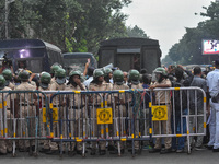 Police are seen during a protest demonstration against the brutal rape and murder of a doctor at RG Kar Medical College and Hospital, in Kol...