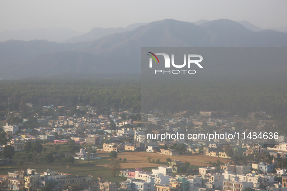 Smog is covering the town of Dehradun in Uttarakhand, India, on April 17, 2024, due to nearby active forest fires. 