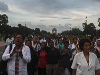 Medical professionals and activists are marching and shouting slogans in a protest condemning the rape and murder of a trainee medic at a ho...