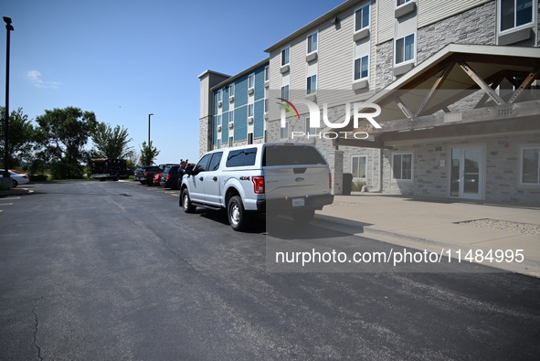 The SWAT team is raiding the WoodSpring Suites hotel in Carol Stream, Illinois, United States, on August 16, 2024. No information is immedia...