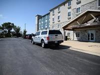 The SWAT team is raiding the WoodSpring Suites hotel in Carol Stream, Illinois, United States, on August 16, 2024. No information is immedia...