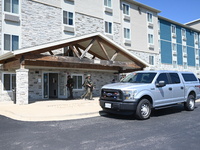 The SWAT team is raiding the WoodSpring Suites hotel in Carol Stream, Illinois, United States, on August 16, 2024. No information is immedia...