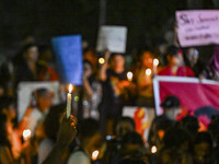 Bangladeshi women protesters are holding candlelight during the protest against rape in Dhaka, Bangladesh, on August 17, 2024. Women are mar...