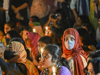 Bangladeshi women protesters are holding candlelight during the protest against rape in Dhaka, Bangladesh, on August 17, 2024. Women are mar...