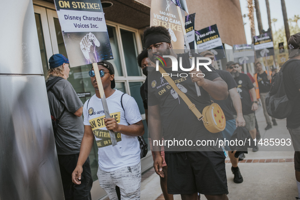 SAG-AFTRA is highlighting actors who voice Disney characters during a video game picket in Burbank, California, on August 15, 2024. 