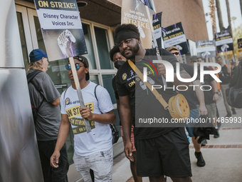 SAG-AFTRA is highlighting actors who voice Disney characters during a video game picket in Burbank, California, on August 15, 2024. (