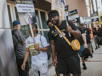 SAG-AFTRA is highlighting actors who voice Disney characters during a video game picket in Burbank, California, on August 15, 2024. (