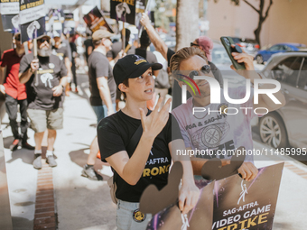 SAG-AFTRA is highlighting actors who voice Disney characters during a video game picket in Burbank, California, on August 15, 2024. (