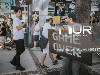 SAG-AFTRA is highlighting actors who voice Disney characters during a video game picket in Burbank, California, on August 15, 2024. (