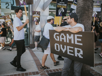 SAG-AFTRA is highlighting actors who voice Disney characters during a video game picket in Burbank, California, on August 15, 2024. (