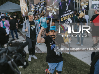 SAG-AFTRA is highlighting actors who voice Disney characters during a video game picket in Burbank, California, on August 15, 2024. (