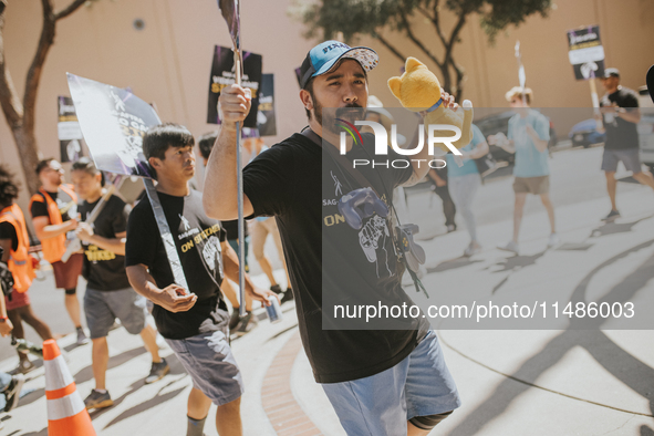 SAG-AFTRA is highlighting actors who voice Disney characters during a video game picket in Burbank, California, on August 15, 2024. 