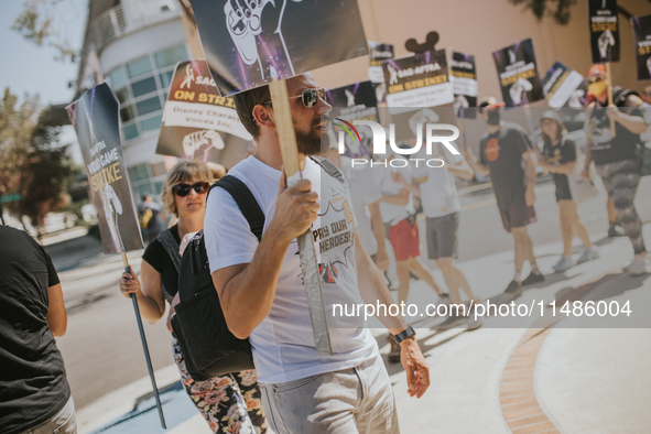 SAG-AFTRA is highlighting actors who voice Disney characters during a video game picket in Burbank, California, on August 15, 2024. 