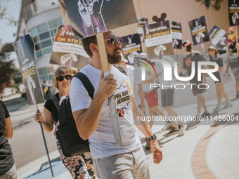 SAG-AFTRA is highlighting actors who voice Disney characters during a video game picket in Burbank, California, on August 15, 2024. (