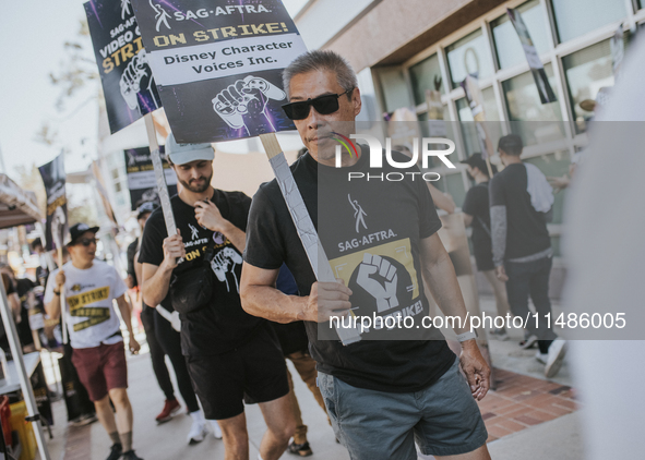 SAG-AFTRA is highlighting actors who voice Disney characters during a video game picket in Burbank, California, on August 15, 2024. 