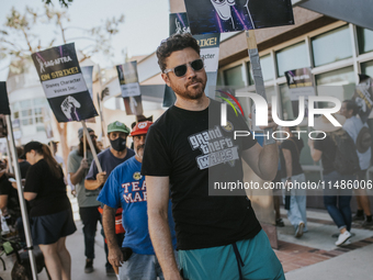 SAG-AFTRA is highlighting actors who voice Disney characters during a video game picket in Burbank, California, on August 15, 2024. (