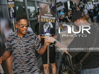 SAG-AFTRA is highlighting actors who voice Disney characters during a video game picket in Burbank, California, on August 15, 2024. (