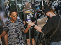 SAG-AFTRA is highlighting actors who voice Disney characters during a video game picket in Burbank, California, on August 15, 2024. (