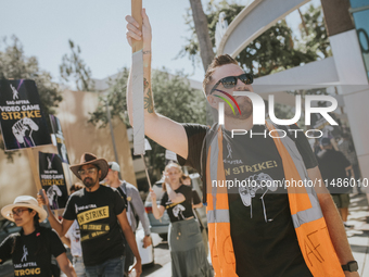 SAG-AFTRA is highlighting actors who voice Disney characters during a video game picket in Burbank, California, on August 15, 2024. (