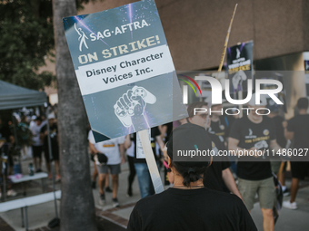 SAG-AFTRA is highlighting actors who voice Disney characters during a video game picket in Burbank, California, on August 15, 2024. (