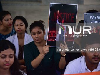 Doctors and medical students are protesting during a nationwide strike against the rape and murder of their colleague in India's West Bengal...