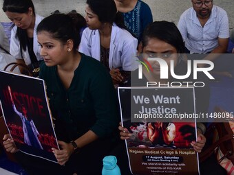 Doctors and medical students are protesting during a nationwide strike against the rape and murder of their colleague in India's West Bengal...