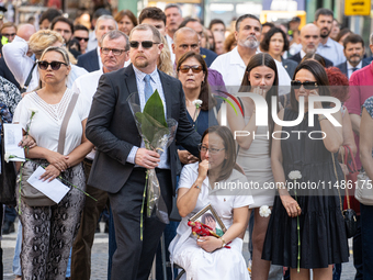 Affected families and politicians are participating in an act of tribute to the victims of the terrorist attacks that took place on August 1...