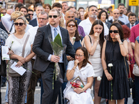 Affected families and politicians are participating in an act of tribute to the victims of the terrorist attacks that took place on August 1...