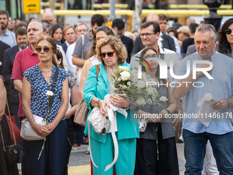 Affected families and politicians are participating in an act of tribute to the victims of the terrorist attacks that took place on August 1...