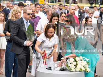 Affected families and politicians are participating in an act of tribute to the victims of the terrorist attacks that took place on August 1...