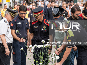 Affected families and politicians are participating in an act of tribute to the victims of the terrorist attacks that took place on August 1...