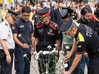 Affected families and politicians are participating in an act of tribute to the victims of the terrorist attacks that took place on August 1...