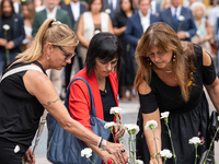 Affected families and politicians are participating in an act of tribute to the victims of the terrorist attacks that took place on August 1...