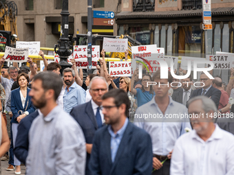 Affected families and politicians are participating in an act of tribute to the victims of the terrorist attacks that took place on August 1...