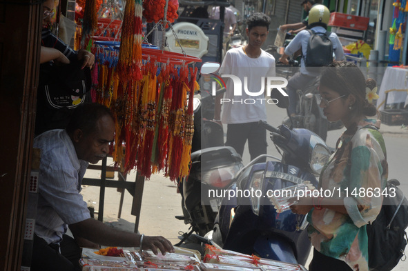 Shoppers are selling Rakhi bracelets in a shop ahead of the Raksha Bandhan festival in Siliguri, India, on August 17, 2024. The Raksha Bandh...