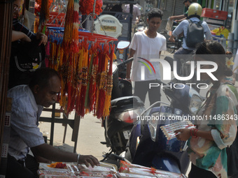 Shoppers are selling Rakhi bracelets in a shop ahead of the Raksha Bandhan festival in Siliguri, India, on August 17, 2024. The Raksha Bandh...