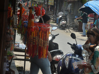 Shoppers are selling Rakhi bracelets in a shop ahead of the Raksha Bandhan festival in Siliguri, India, on August 17, 2024. The Raksha Bandh...