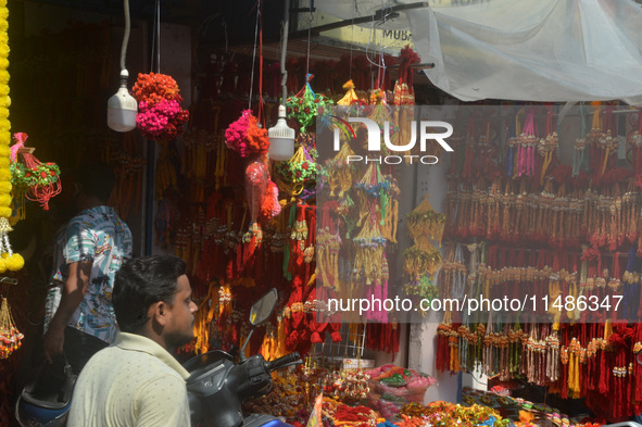 Shoppers are selling Rakhi bracelets in a shop ahead of the Raksha Bandhan festival in Siliguri, India, on August 17, 2024. The Raksha Bandh...