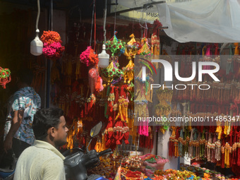 Shoppers are selling Rakhi bracelets in a shop ahead of the Raksha Bandhan festival in Siliguri, India, on August 17, 2024. The Raksha Bandh...