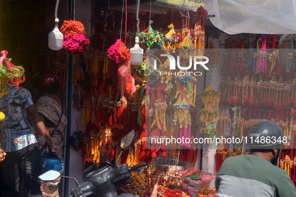 Shoppers are selling Rakhi bracelets in a shop ahead of the Raksha Bandhan festival in Siliguri, India, on August 17, 2024. The Raksha Bandh...