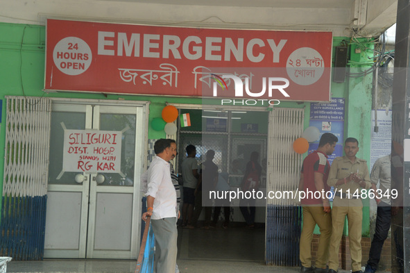 The main entrance of the busiest Siliguri District hospital in Siliguri, India, on August 17, 2024, as other medical staff around India are...