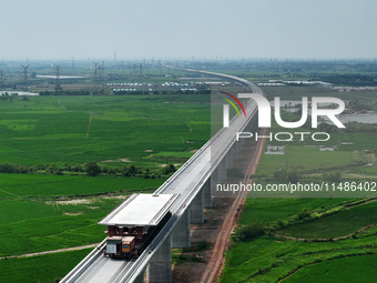 Preparations are being made for the construction of the 16.4-km Nanchang-Jiujiang High-speed Railway Fuhe River Super Bridge in Nanchang, Ch...