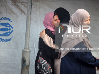 Palestinians are mourning their relatives, killed in an Israeli strike, at the Al-Aqsa Martyrs hospital in Deir el-Balah in the central Gaza...