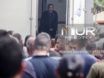 Palestinians are mourning their relatives, killed in an Israeli strike, at the Al-Aqsa Martyrs hospital in Deir el-Balah in the central Gaza...