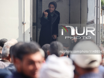 Palestinians are mourning their relatives, killed in an Israeli strike, at the Al-Aqsa Martyrs hospital in Deir el-Balah in the central Gaza...