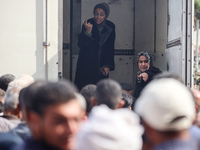 Palestinians are mourning their relatives, killed in an Israeli strike, at the Al-Aqsa Martyrs hospital in Deir el-Balah in the central Gaza...