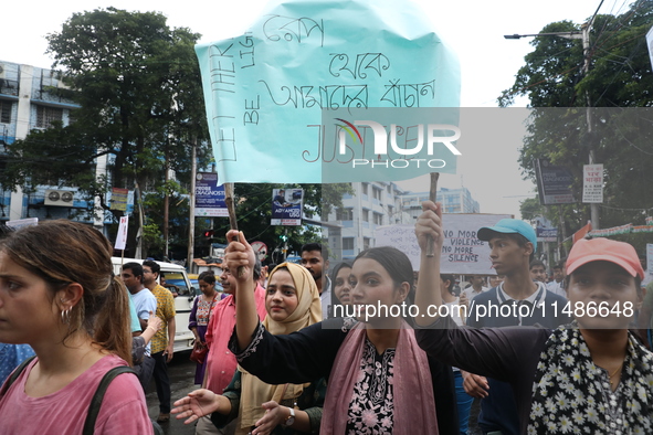 Medical professionals are holding placards and shouting slogans during a nationwide strike by doctors in a protest march against the recent...