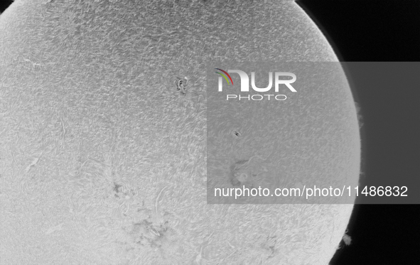 (EDITOR'S NOTE: This image was captured with an H-Alpha solar telescope and is the result of stacking the best 20% of frames. The final stac...